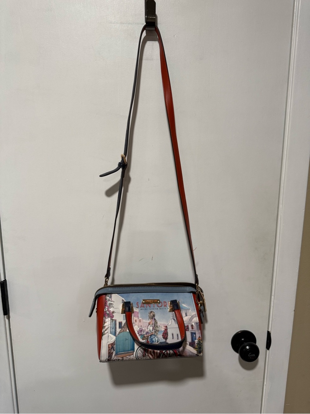 Nicole Lee Scenic Print Crossbody with Red Trim and Blue Accents